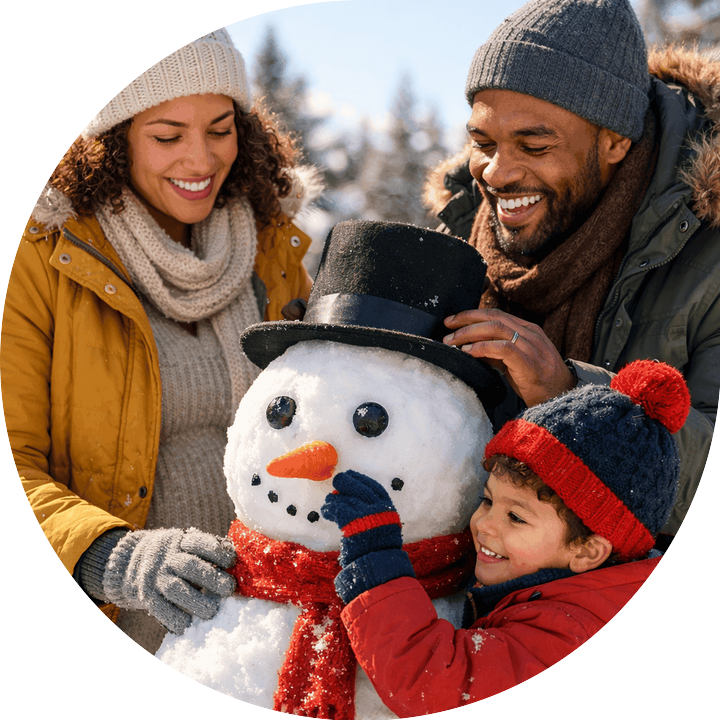 Expecting parents with 4 year old posing inf front of their snowman americord portrait optimized 20251229
